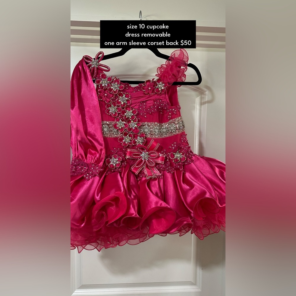 Stunning Pink Ruffled Dress with Floral Embellishments
